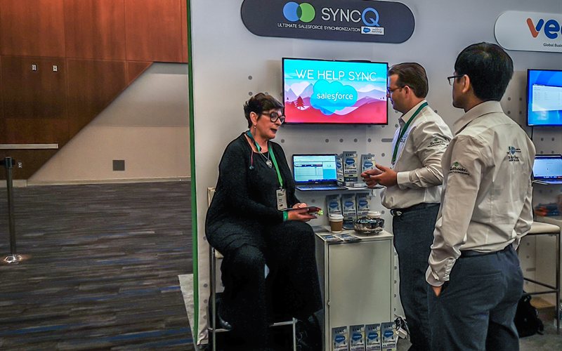 SyncQ team member demoing product